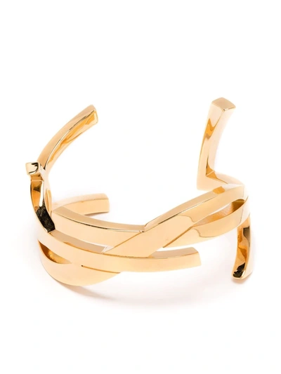 Shop Saint Laurent Monogram Cuff Bracelet In Gold