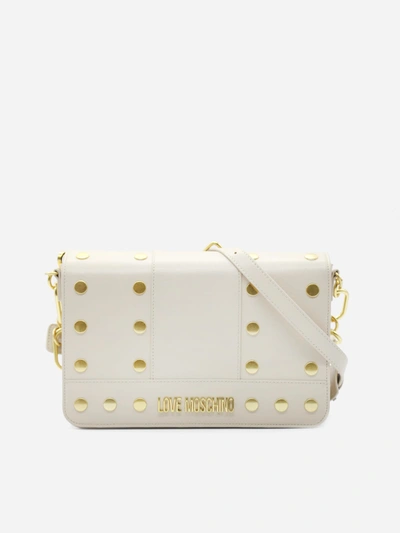 Shop Love Moschino Shoulder Bag With All-over Studs Detail In White