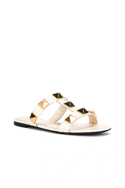 Shop Valentino Roman Stud Slides In Light Ivory