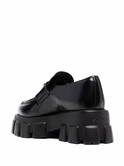 Shop Prada Leather Loafers In Black