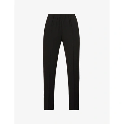 Shop Dries Van Noten Womens Black Tapered Mid-rise Crepe Trousers 8