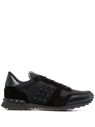 Shop Valentino Rockstud Low-top Sneakers In Black