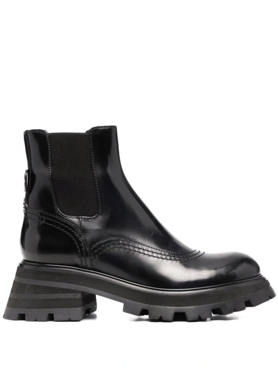 Shop Alexander Mcqueen Ridged-sole Leather Boots In Schwarz