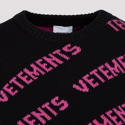 Shop Vetements Allover Logo Sweater In Black