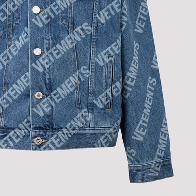Shop Vetements All Over Logo Denim Jacket In Blue