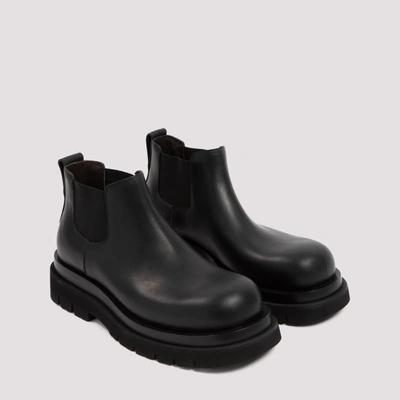 Shop Bottega Veneta Leather Lug Boots Shoes In Black