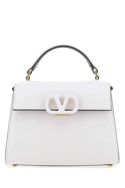 Shop Valentino Logo Plaque Foldover Tote Bag In White