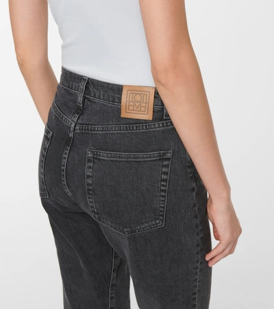 Shop Totême Mid-rise Twisted-seam Straight Jeans In Grey
