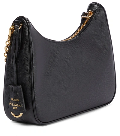Prada Curved Black Bag With Gold Chain Strap And Logo Plaque In Black