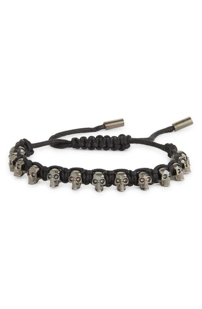 Shop Alexander Mcqueen Skull Woven Cord Bracelet In Black