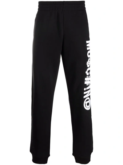 Shop Moschino Symbols Logo-embroidered Fleece Track Pants In 黑色