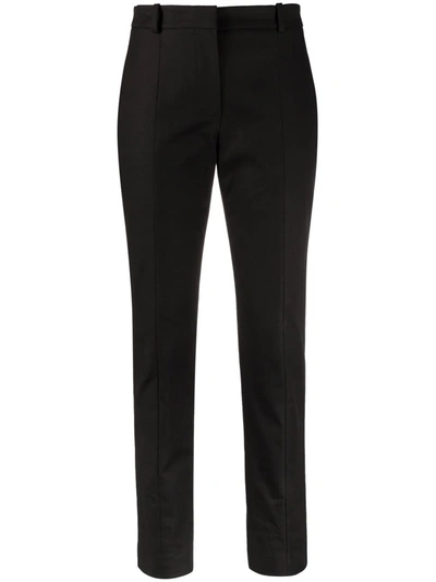 Shop Alexander Mcqueen Slim-cut Trousers In Black