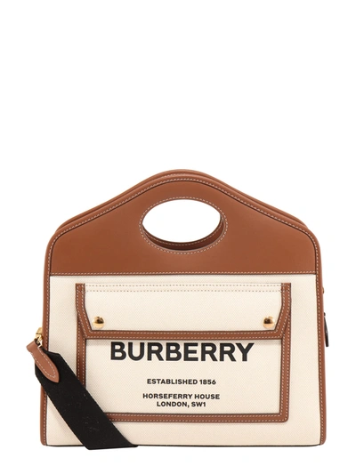 Shop Burberry Pocket Handbag In Beige