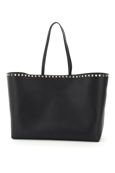 Shop Valentino Garavani Large Rockstud Tote In Black