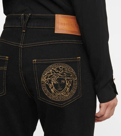 Shop Versace Medusa Bootcut Jeans In Black