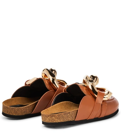 Shop Jw Anderson Embellished Leather Slippers In Brown