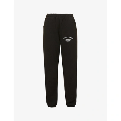 Shop Sporty And Rich Wellness Studio Branded Mid-rise Cotton-jersey Jogging Bottoms In Noir White