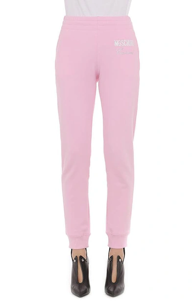 Shop Moschino Couture Logo Crystal Embellished Cotton Joggers In Fantasy Print Pink
