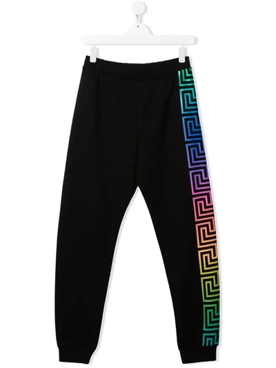 Shop Versace Side-stripe Print Track Pants In Black