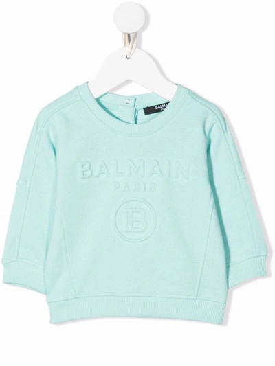 Shop Balmain Embossed-logo Cotton Sweatshirt In Blue