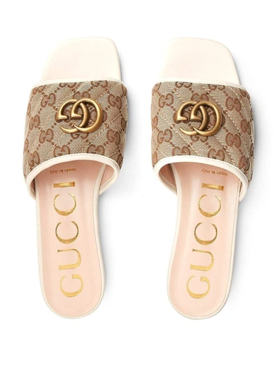 Shop Gucci Sandals Beige