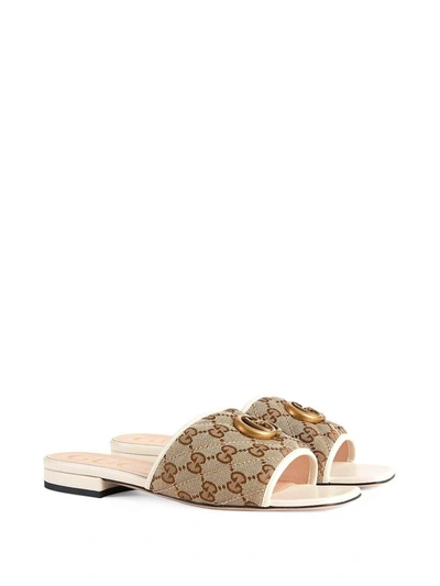 Shop Gucci Sandals Beige