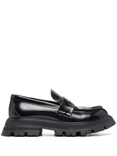 Shop Alexander Mcqueen Polished-finished Ridged-sole Loafers In Black