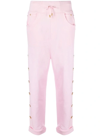Shop Balmain Button-embellished Track Pants In Rosa