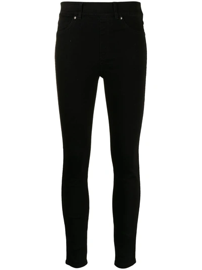 Shop Spanx Clean Mid-rise Skinny Jeans In Schwarz