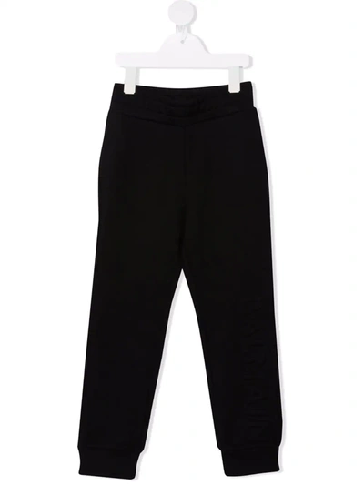 Shop Balmain Debossed-logo Track Pants In Black