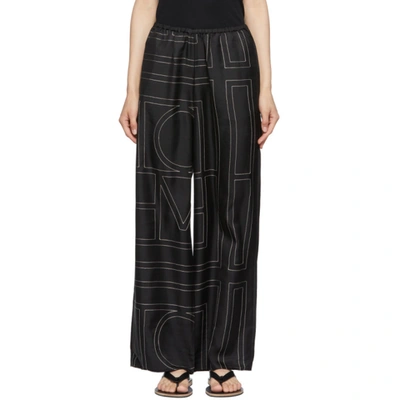 Shop Totême Black Silk Monogram Pj Lounge Pants In 925 Black Monogram