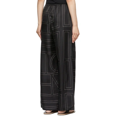 Shop Totême Black Silk Monogram Pj Lounge Pants In 925 Black Monogram