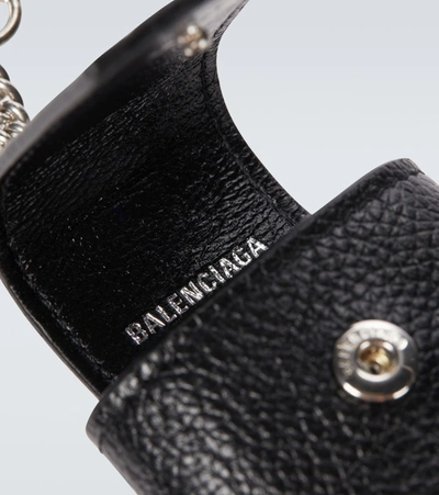Shop Balenciaga Cash Airpods Case In Black