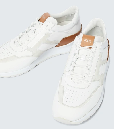 Shop Tod's Allaciato Leather Sneakers In White