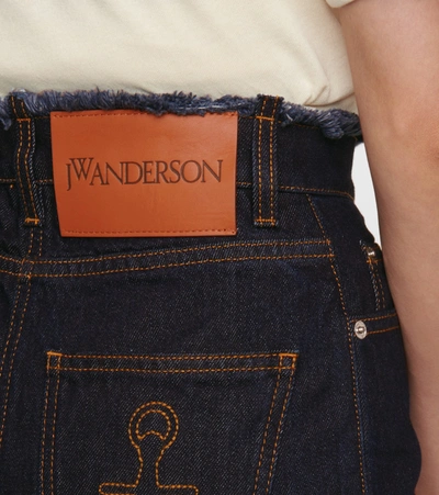 Shop Jw Anderson High-rise Flared Jeans In Blue