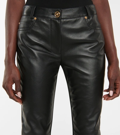 Shop Versace Medusa Leather And Jersey Skinny Pants In Black