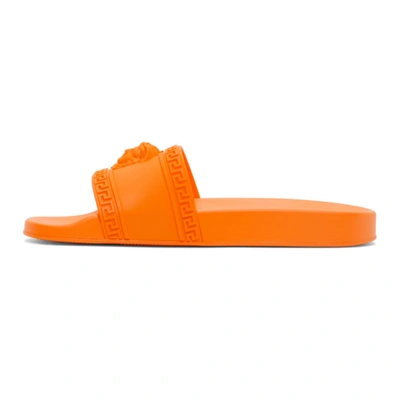 Shop Versace Orange Palazzo Slides