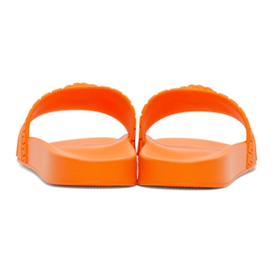 Shop Versace Orange Palazzo Slides