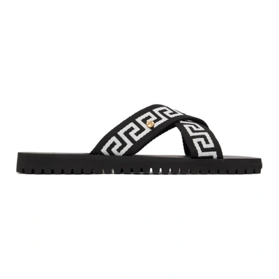 Shop Versace Black & White Nastro Greca Cross Strap Sandals In Black/white