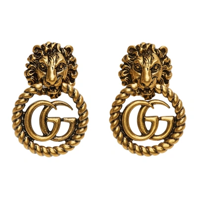 Shop Gucci Gold Gg Lion Head Earrings