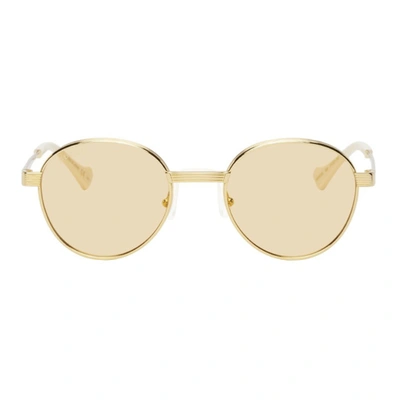 Shop Gucci Gold Gg0872 Sunglasses In Gold/yellow