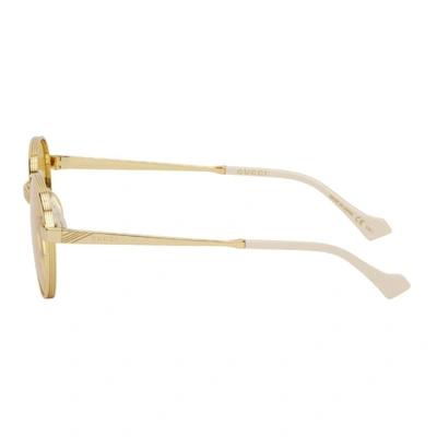 Shop Gucci Gold Gg0872 Sunglasses In Gold/yellow