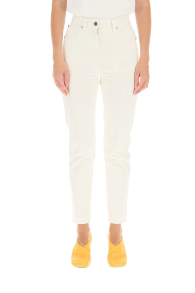 Shop Fendi Logo Embossed Slim Fit Jeans In White