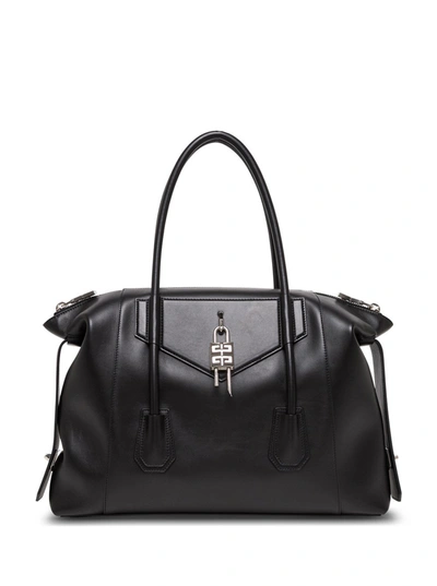 Shop Givenchy Antigona Soft Lock Handbag In Black Leather