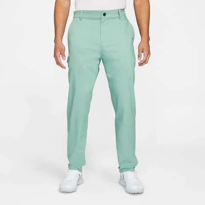 Shop Nike Dri-fit Uv Men's Standard Fit Golf Chino Pants In Healing Jade