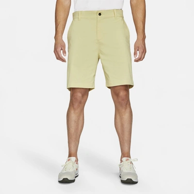Shop Nike Dri-fit Uv Men's 9" Golf Chino Shorts In Lemon Drop