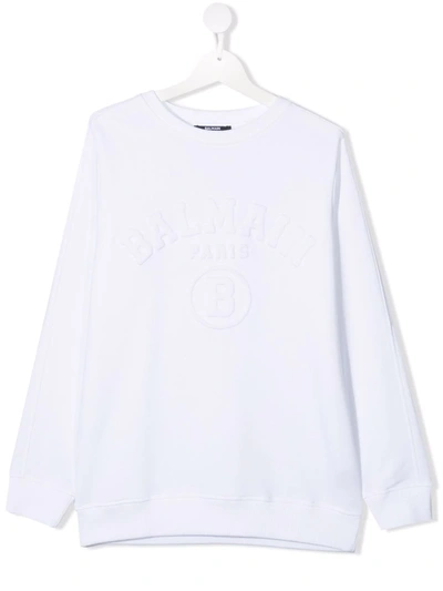 Shop Balmain Teen Embossed Long-sleeved Logo Sweatshirt In White