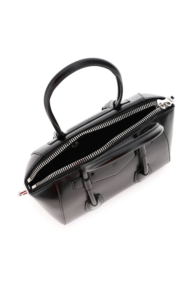 Shop Givenchy Antigona Lock Small Bag In Black