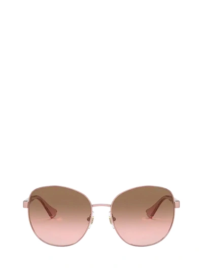 Shop Ralph Lauren Round Frame Sunglasses In Gold