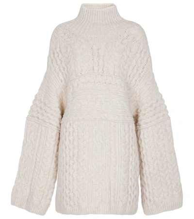 Shop Nanushka Raw Cable-knit Wool-blend Sweater In White